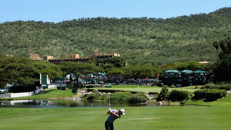 Nicolas Colsaerts of Belgium plays his second shot into the ninth green during the first round of the Nedbank Golf Challenge