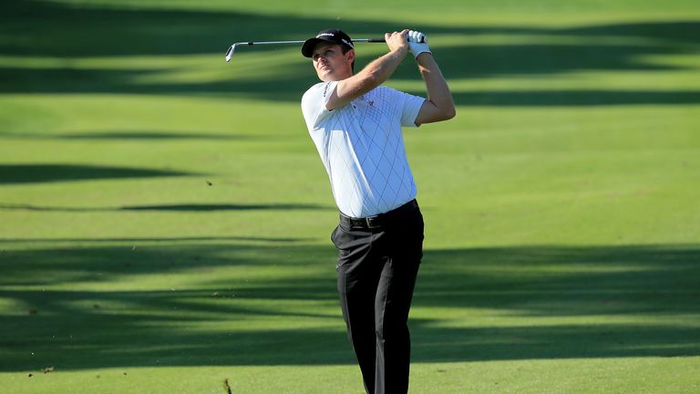 Justin Rose of England plays his second shot at the par 4, 17th hole during the final round of the 2013 Turkish Airlines Open.