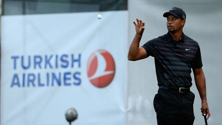 Tiger Woods catches his ball during the first round of the Turkish Airlines Open at The Montgomerie Maxx Royal Course