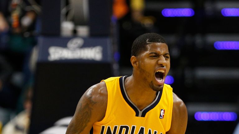 Paul George #24 of the Indiana Pacers celebrates against the Orlando Magic during the game at Bankers Life Fieldhouse on October 29, 2013 in Indianapolis, Indiana. The Pacers won 97-87. 