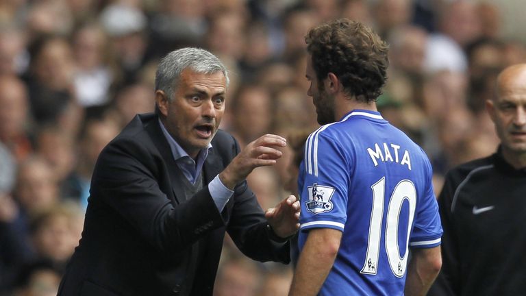 Jose Mourinho (L) gestures to midfielder Juan Mata (R) during the match between Tottenham Hotspur and Chelsea at White Hart Lane.