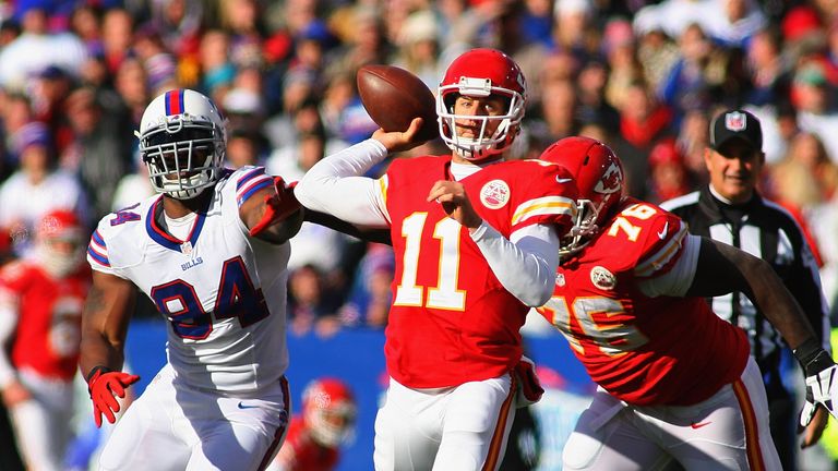Alex Smith #11 of the Kansas City Chiefs throws against the Buffalo Bills at Ralph Wilson Stadium on November 3, 2013 in Orchard Park, New York