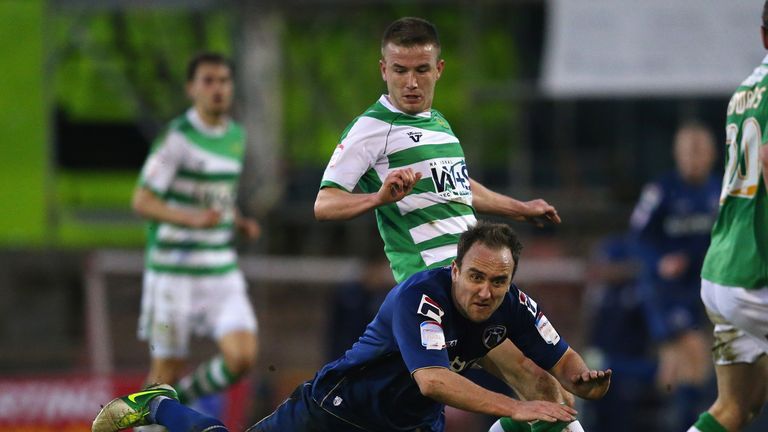Lee Croft of Oldham Athletic is fouled by Paddy Madden of Yeovil Town during the League One match.