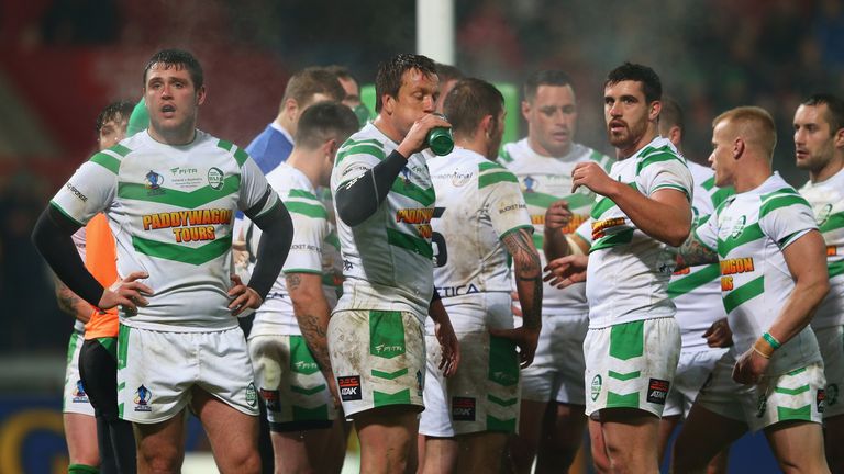 Luke Ambler (L) of Ireland looks on alongside team mates after conceding another try in their 0-50 defeat during the Rugby League World Cup Group A match between Australia and Ireland at Thomond Park