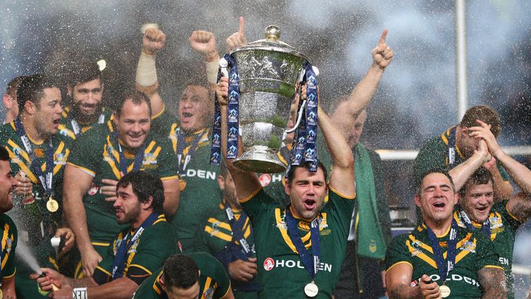 Cameron Smith the captain of Australia lifts the winners trophy after his sides 34-2 victory during the Rugby League World Cup Final