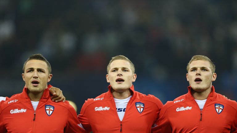 CARDIFF, WALES - OCTOBER 26:  Sam Burgess (L) George Burgess (C) and Tom Burgess (R) of England sing the national anthem during the Rugby League World Cup Group A match between Australia and England at the Millennium Stadium on October 26, 2013 in Cardiff, Wales.  (Photo by Michael Steele/Getty Images)
