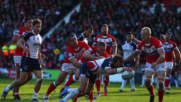 WREXHAM, WALES - NOVEMBER 03:  Clint Newton of USA scores his sides opening try during the Rugby League World Cup Group D match between Wales and USA at the Glyndwr University Racecourse Stadium on November 3, 2013 in Wrexham, Wales.  (Photo by Michael Steele/Getty Images)