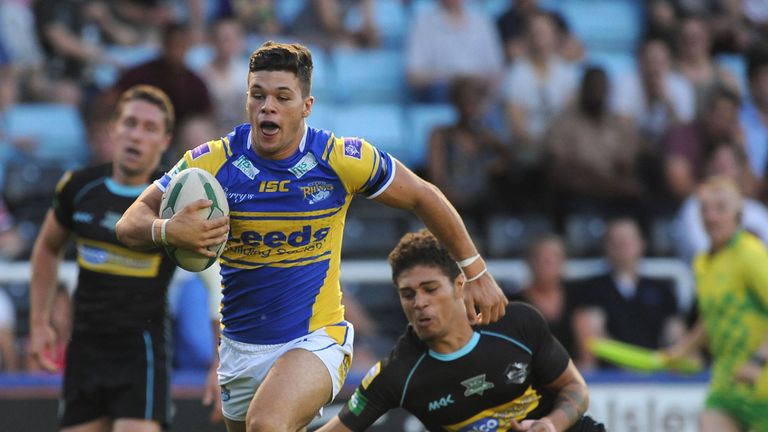 Alex Foster of Leeds Rhinos breaks away to score a try during the Super League match between London Broncos and Leeds Rhinos