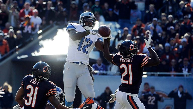 Major Wright of the Chicago Bears and Jeremy Ross of the Detroit Lions go up for the ball at Soldier Field