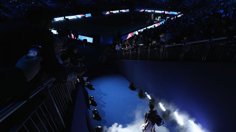 Novak Djokovic walks out for his men's singles match against Juan Martin Del Potro of Argentina during day four of the Barclays ATP World Tour Finals at O2 Arena