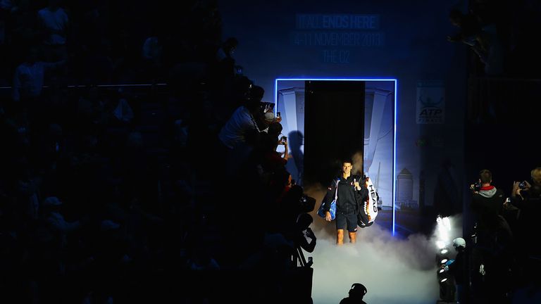 Novak Djokovic walks out for his men's singles semi-final match against Stanislas Wawrinka of Switzerland during day seven of the ATP World Tour Finals at O2 Arena