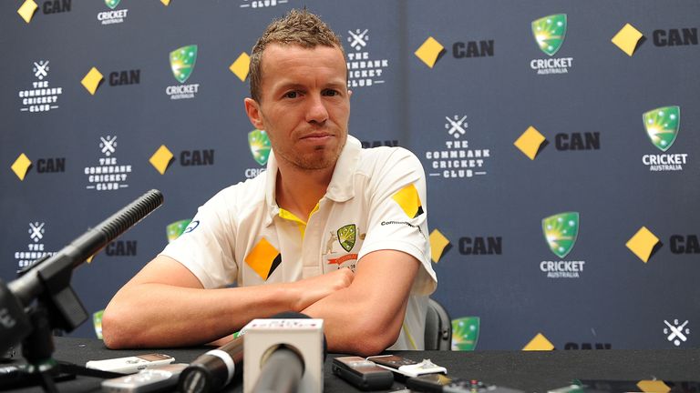 Peter Siddle of Australia looks on before a press conference during an Australian Men's cricket team fan day at Queen St Mall on November 18, 2013 in Brisbane, Australia.  