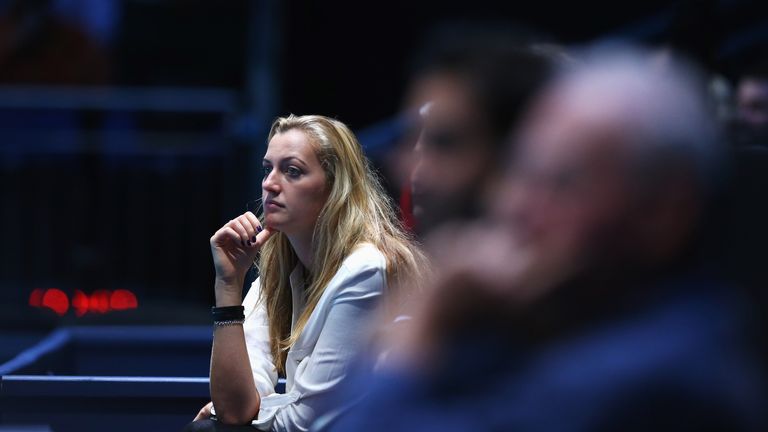Petra Kvitova of the Czech Republic watches the men's doubles match between Leander Paes of India and Radek Stepanek of the Czech Republic and Marcel Granollers and Marc Lopez of Spain during day five of the Barclays ATP World Tour Finals at O2 Arena on November 8, 2013 in London, England.