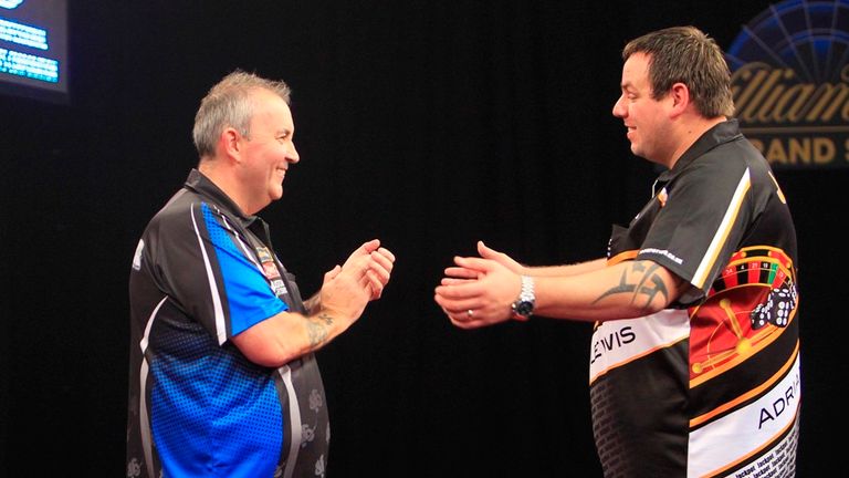 Phil Taylor and Adrian Lewis at the 2013 Grand Slam of Darts (Lawrence Lustig)