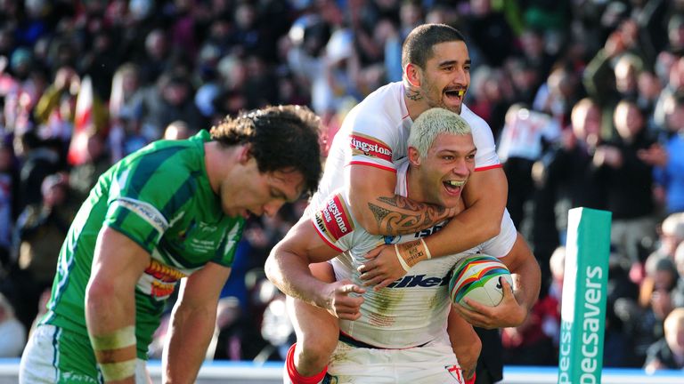 England's Ryan Hall celebrates with Rangi Chase (top) after scoring his hat-trick during the 2013 World Cup match at the John Smith's Stadium, Huddersfield.
