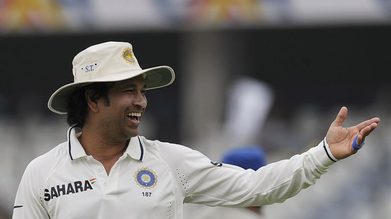 Indian cricketer Sachin Tendulkar gestures prior to the start of the fourth day of the first Test match between India and New Zealand at the Rajiv Gandhi International cricket stadium in Hyderabad on August 26, 2012. 