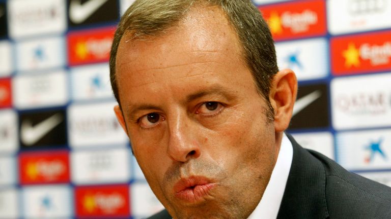 Barcelona's President Sandro Rosell grimaces during a press conference in Barcelona on July 19, 2013. Rosell confirmed during a news conference today that coach Tito Vilanova stepped down because he has suffered a relapse of cancer. AFP PHOTO/ QUIQUE GARCIA        (Photo credit should read QUIQUE GARCIA/AFP/Getty Images)