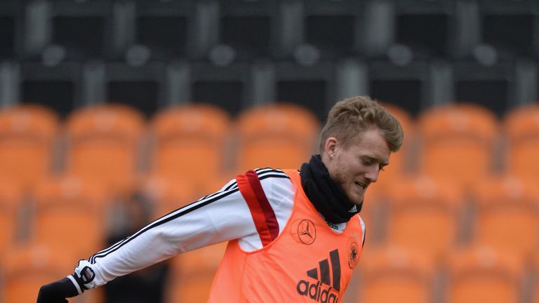 BARNET, ENGLAND - NOVEMBER 17:  Andre Schuerrle of Germany in action during the Germany Training Session at The Hive on November 17, 2013 in Barnet, England.  (Photo by Tony Marshall/Getty Images)
