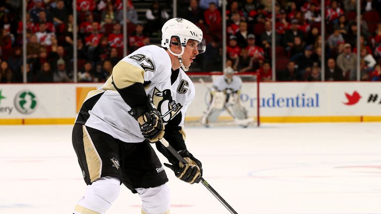 Sidney Crosby #87 of the Pittsburgh Penguins looks to pass in the first period against the New Jersey Devils at Prudential Center on November 16, 2013 in Newark, New Jersey.  