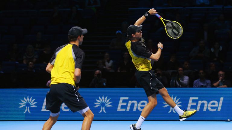 Bob (R) and Mike Bryan of the United States in action in their men's doubles final match against Fernando Verdasco and David Marrero of Spain during day eight of the Barclays ATP World Tour Finals at O2 Arena on November 11, 2013 in London, England