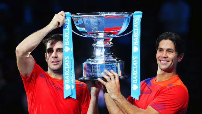 David Marrero (L) and Fernando Verdasco of Spain pose with the trophy after victory in their men's doubles final match against Bob and Mike Bryan of the United States during day eight of the Barclays ATP World Tour Finals at O2 Arena on November 11, 2013 in London, England