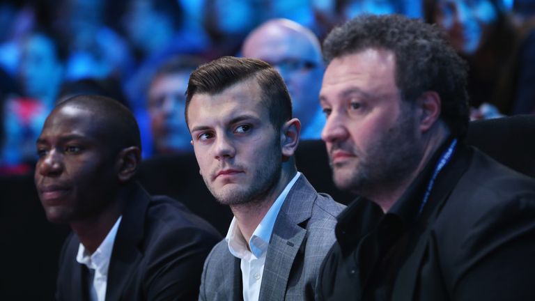 Jack Wilshire (C) of Arsenal watches the men's singles final match between Rafael Nadal of Spain and Novak Djokovic of Serbia during day eight of the Barclays ATP World Tour Finals at O2 Arena on November 11, 2013 in London, England