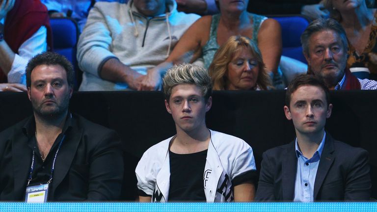 LONDON, ENGLAND - NOVEMBER 11: Niall Horan (C) of One Direction watches the men's singles final match between Rafael Nadal of Spain and Novak Djokovic of Serbia during day eight of the Barclays ATP World Tour Finals at O2 Arena on November 11, 2013 in London, England.  (Photo by Clive Brunskill/Getty Images)