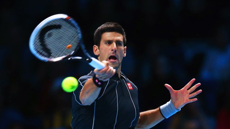 Novak Djokovic of Serbia hits a forehand in his men's singles final match against Rafael Nadal of Spain during day eight of the Barclays ATP World Tour Finals at O2 Arena on November 11, 2013 in London, England