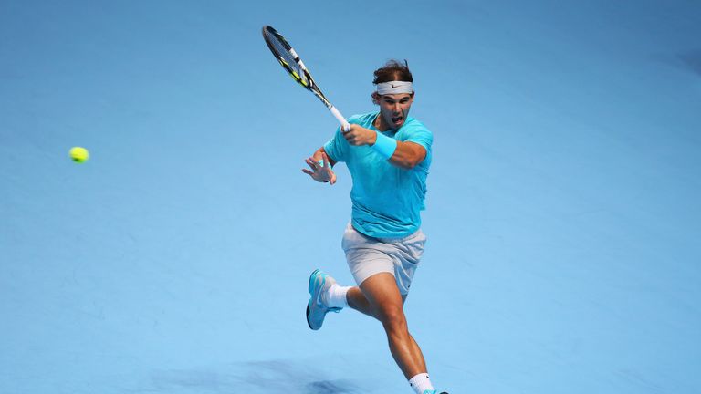 Rafael Nadal of Spain hits a forehand in his men's singles final match against Novak Djokovic of Serbia during day eight of the Barclays ATP World Tour Finals at O2 Arena on November 11, 2013 in London, England