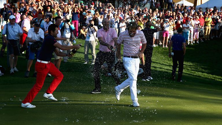 Victor Dubuisson is congratulated by his fellow French Tour pros after winning the 2013 Turkish Airlines Open