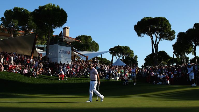 Victor Dubuisson of France celebrates winning the 2013 Turkish Airlines Open
