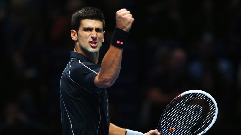 Novak Djokovic celebrates victory against Richard Gasquet during day six of the Barclays ATP World Tour Finals
