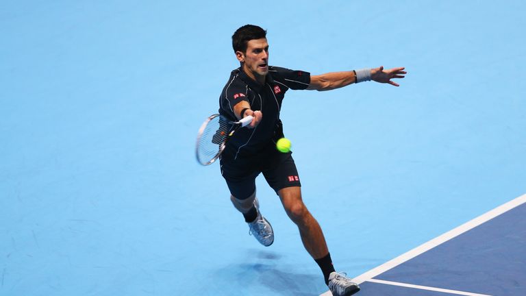 Novak Djokovic hits a forehand in his men's singles match against Richard Gasquet of France