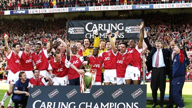 3 May 1998:  The Arsenal team celebrate with the trophy after winning the championship in the FA Carling Premiership match against Everton at Highbury in L