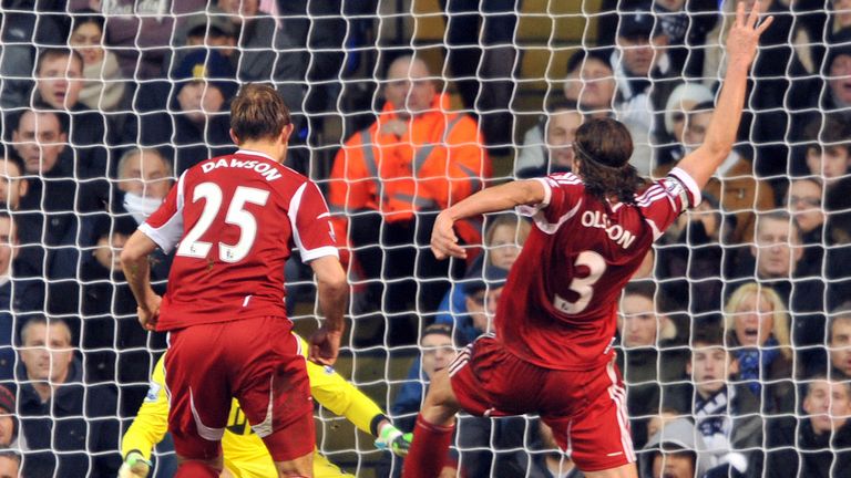 Jonas Olsson: Stabs home his equaliser for Albion