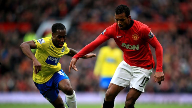 Nani of Manchester United is pursued by Vurnon Anita of Newcastle