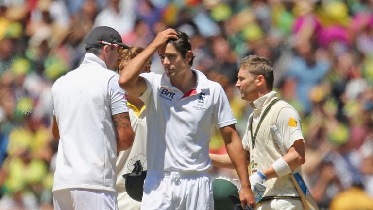 English captain Alastair Cook looks dejected as Australian captain Michael Clarke shakes the hand of Kevin Pietersen at the end of the fourth Ashes Test.