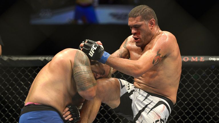 Antonio 'Bigfoot' Silva of Brazil connects with a knee to the face during his UFC Brisbane bout against Mark Hunt