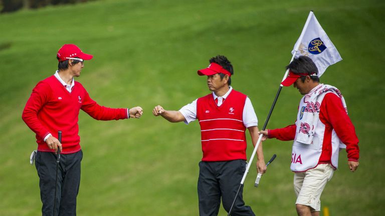 Ryo Ishikawa (L) and Hiroyuki Fujita secured a 3&2 success for Asia
