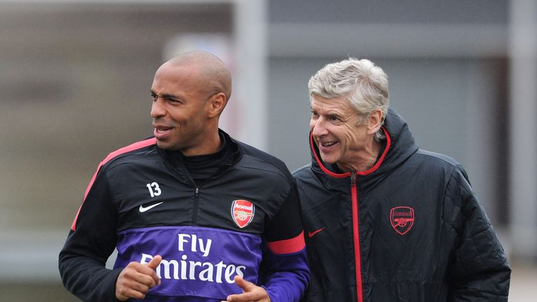 Arsenal manager Arsene Wenger with ex player Thierry Henry
