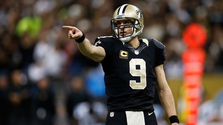 Drew Brees #9 of the New Orleans Saints reacts after throwing a pass against the Carolina Panthers 