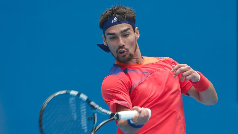 Fabio Fognini returns a shot during day seven of the 2013 China Open