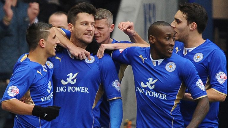 Leicester City's David Nugent (second left) celebrates with his team mates after scoring the opening goal of the game against Burnley from the penalty spot