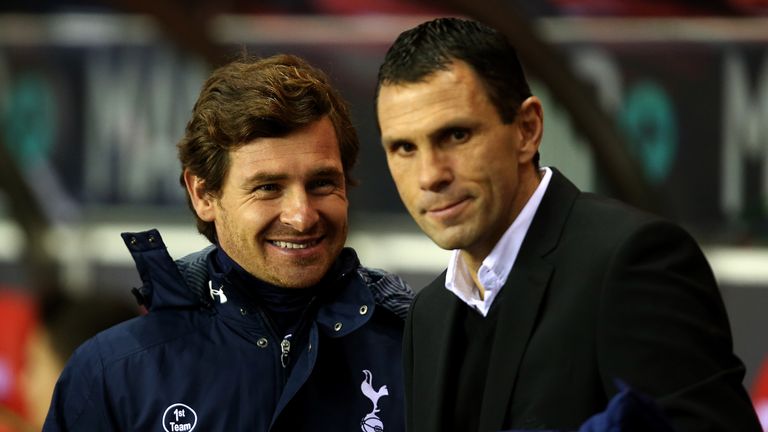 Manager of Sunderland Gus Poyet and Manager of Tottenham Hotspur Andre Villas Boas share a joke during the Premier League match