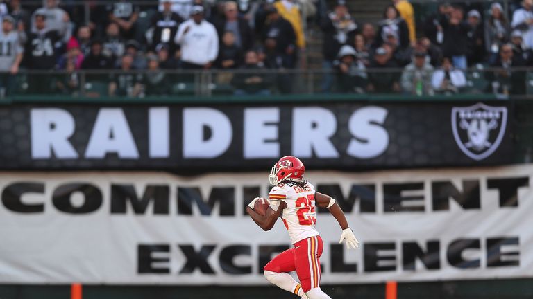 Jamaal Charles of the Kansas City Chiefs runs for a touchdown against the Oakland Raiders