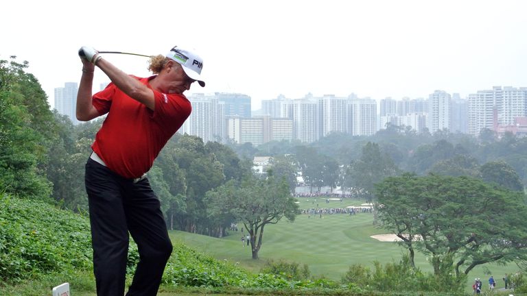 Miguel Angel Jimenez of Spain plays a shot during the final round of the UBS Hong Kong Open