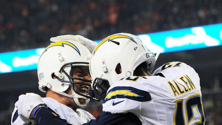 Keenan Allen #13 celebrates with Philip Rivers #17 of the San Diego Chargers after scoring a second quarter touchdown against the Denver Broncos