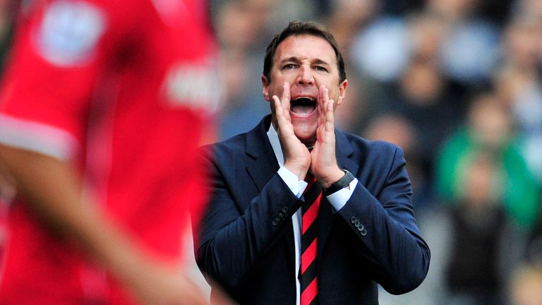 Cardiff City's Scottish manager Malky MacKay shouts from the touchline during the English Premier League football match between Fulham and Cardiff City