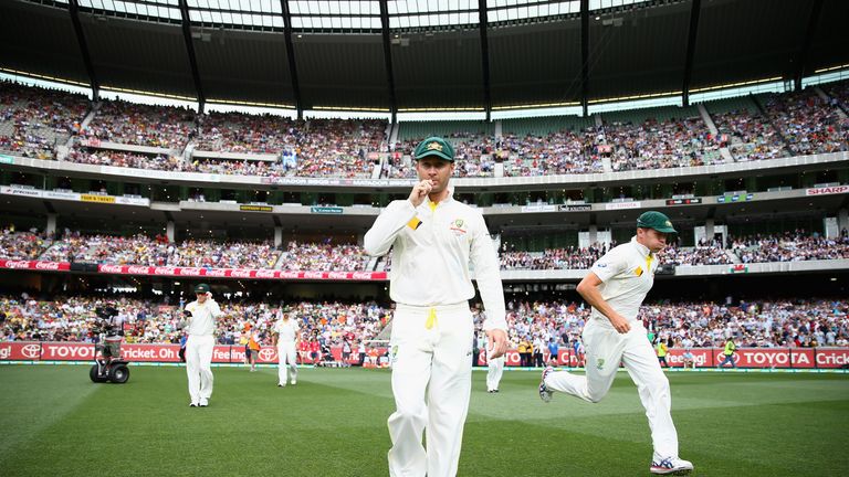 Michael Clarke of Australia leads his team out during day one of the fourth Ashes Test against England at the MCG.