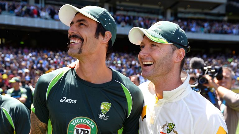 Australian captain Michael Clarke celebrates with team-mate Mitchell Johnson (left) after defeating England in the fourth Ashes Test in Melbourne
